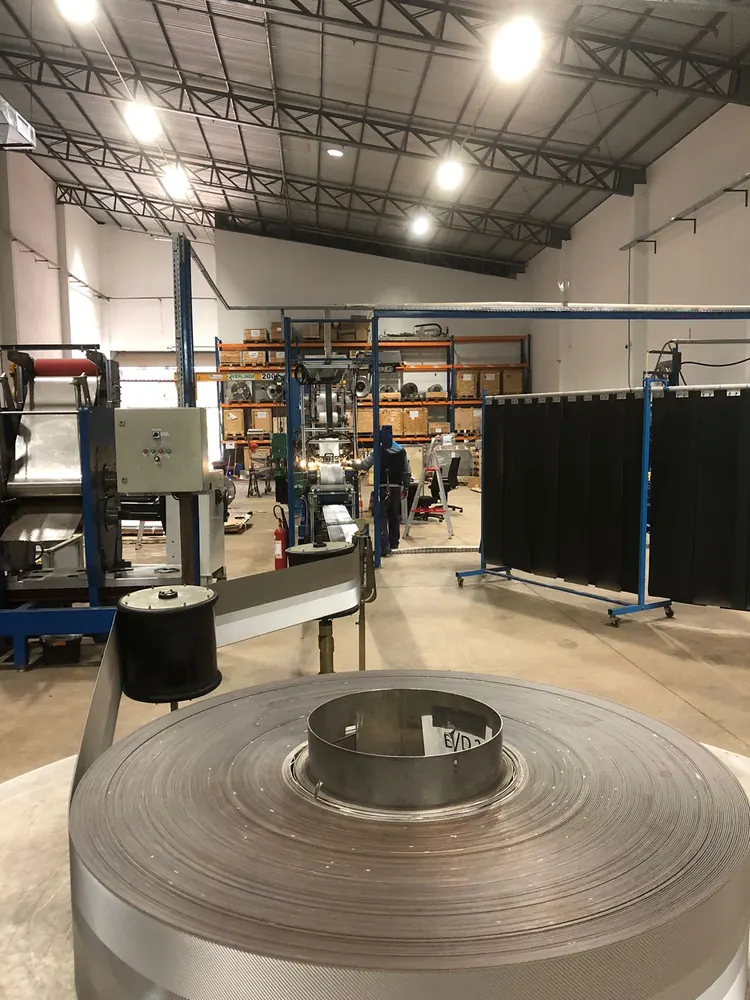 Coiled exchange surface at the core production station
